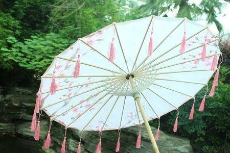 君乐雨启伞中的乐读音是啥